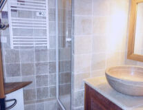 sink, bathtub, indoor, plumbing fixture, shower, countertop, tap, cabinetry, mirror